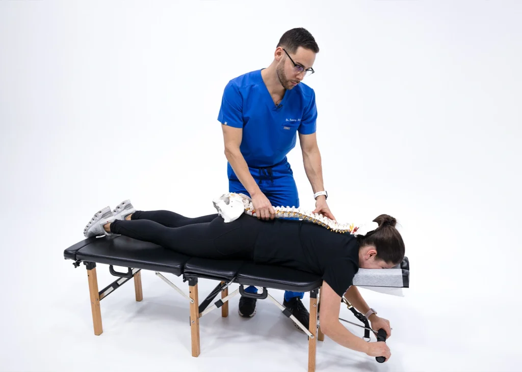 Person receiving a chiropractic back adjustment to relieve joint pain and improve mobility in a natural way.