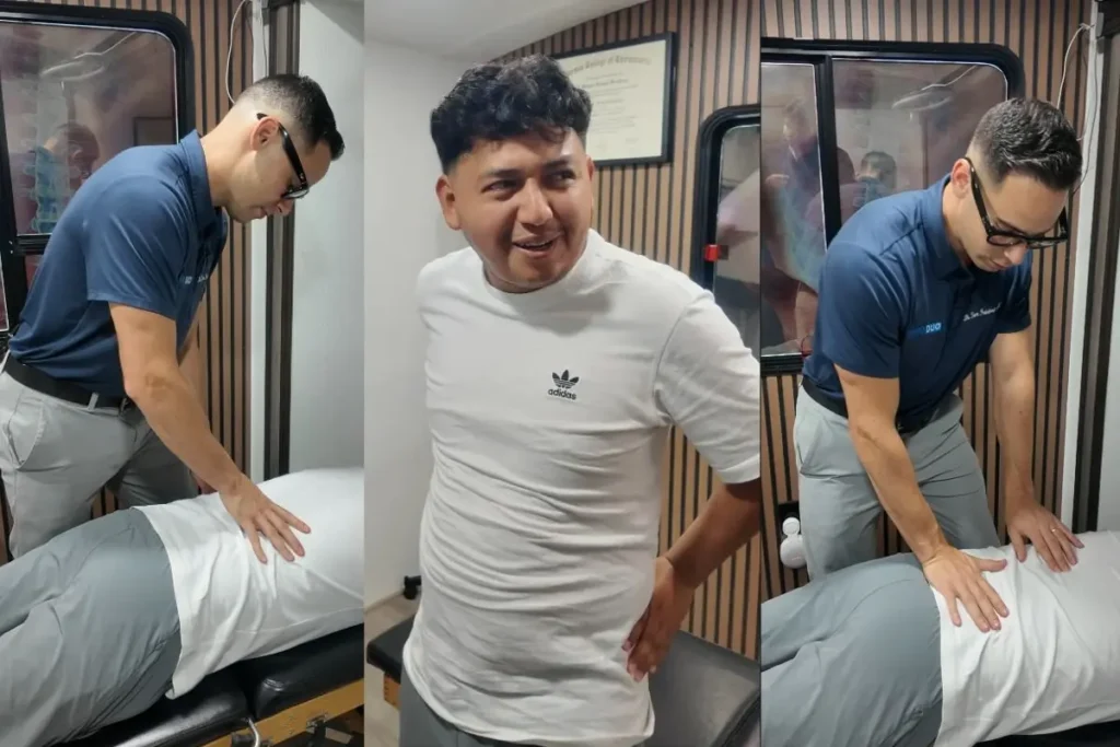 Trabajador latino con dolor de espalda baja por trabajo físico recibiendo atención quiropráctica